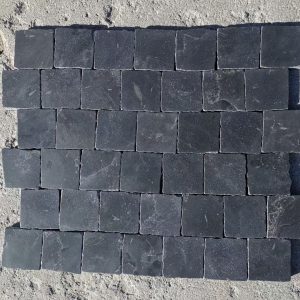 Honed square black limestone tiles